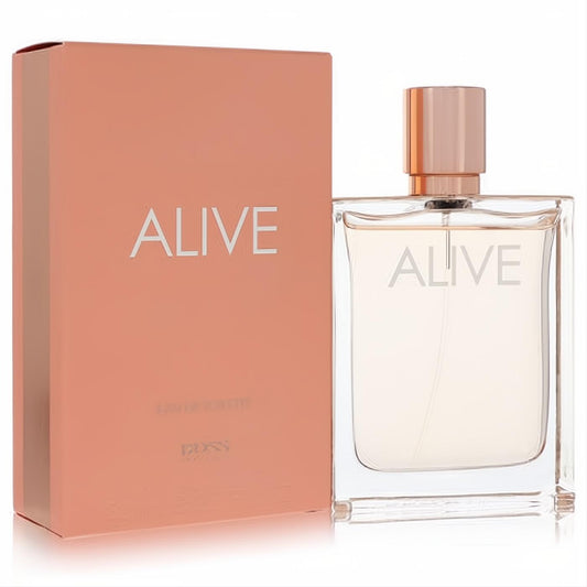 Hugo Boss Alive women's EDT. Clear glass bottle with rose gold cap and elegant peach-colored box.