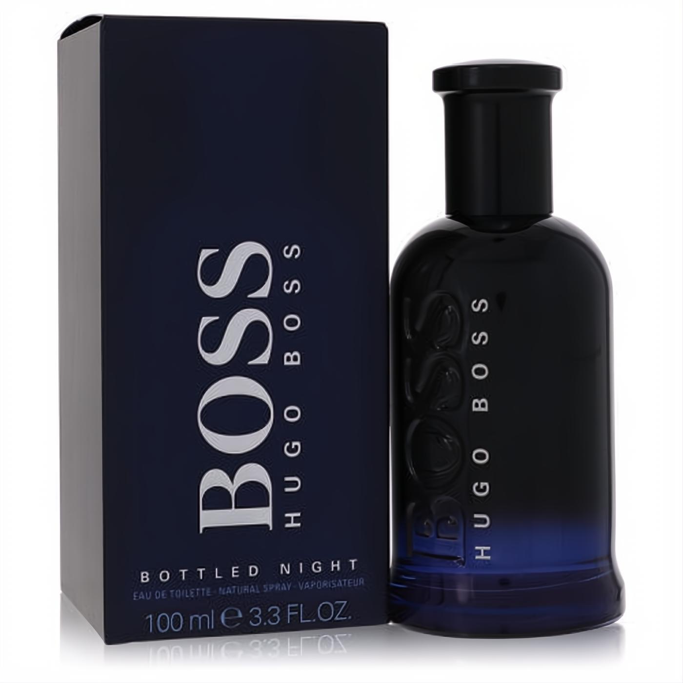 Boss Bottled Night 3.3 oz EDT spray. Elegant dark blue glass bottle with a captivating gradient, beside its sleek matching box.