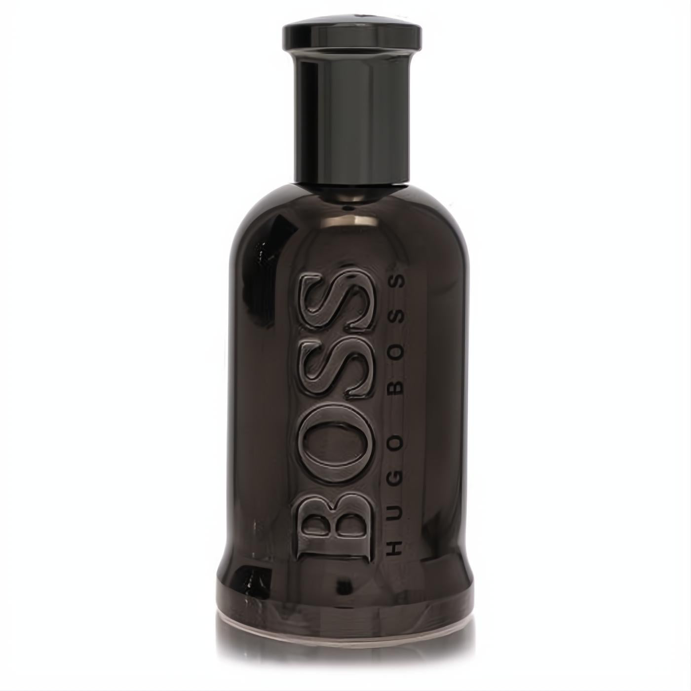 Bold Boss Bottled United 3.3 oz men's fragrance. Sleek, glossy dark grey bottle with prominent BOSS branding.