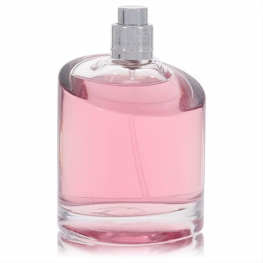Radiant pink Boss Femme by Hugo Boss 2.5 oz EDP spray tester in an elegant clear glass bottle with a sleek silver cap.
