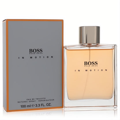 Boss In Motion by Hugo Boss 3.3 oz men's EDT. Sleek clear bottle with warm amber liquid, silver cap, and modern gray box with orange trim.