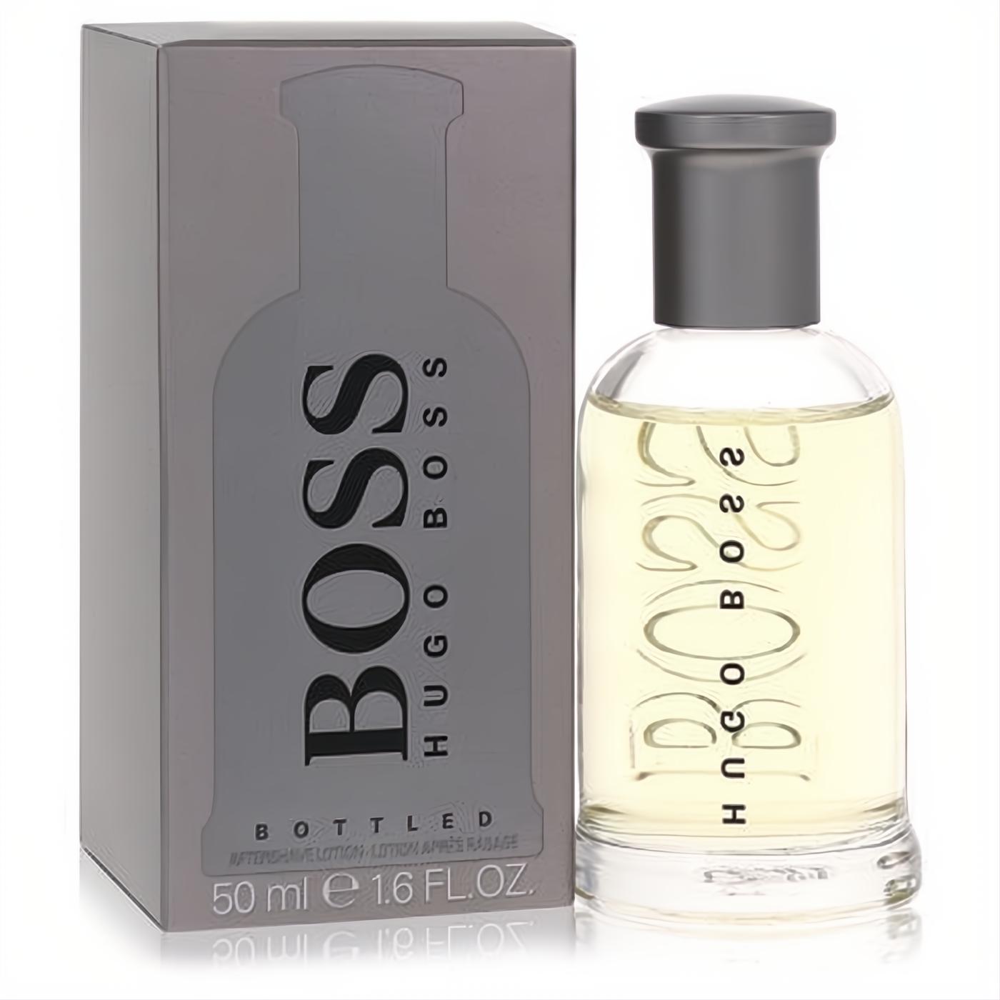 Experience Boss No. 6 Hugo Boss Bottled 1.6 oz after shave. Clear glass bottle with elegant gray cap and matching box.