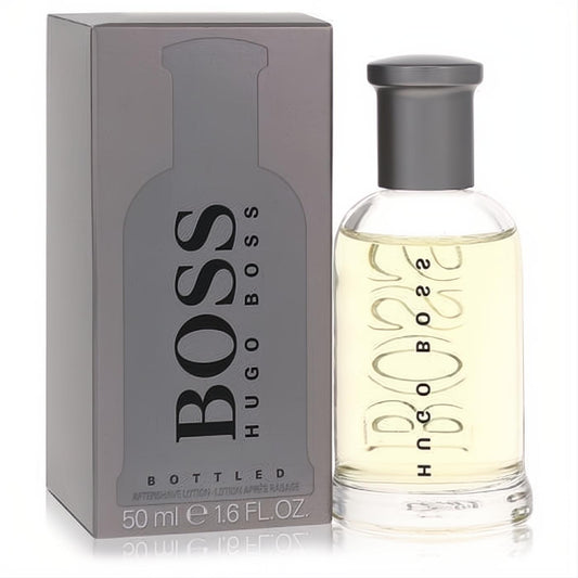 Experience Boss No. 6 Hugo Boss Bottled 1.6 oz after shave. Clear glass bottle with elegant gray cap and matching box.
