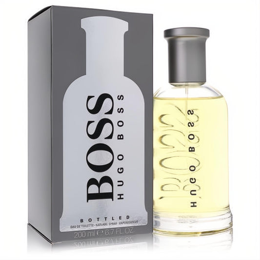 Hugo Boss No. 6 Bottled 6.7 oz EDT for men. Clear glass bottle with golden liquid, sleek grey cap, beside its iconic grey box.
