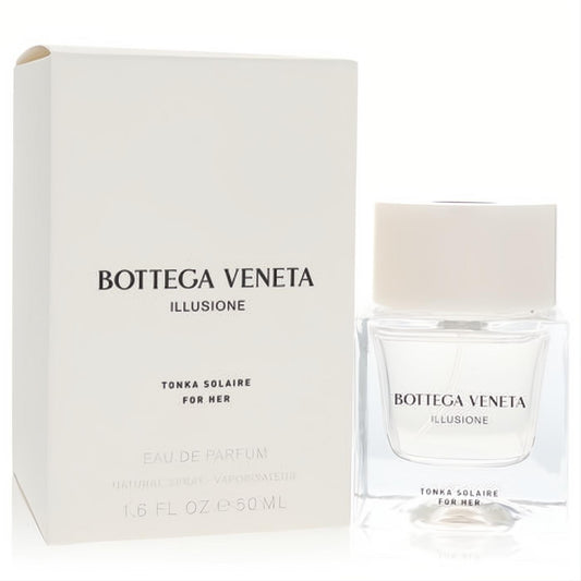 Exquisite Bottega Veneta Illusione Tonka Solaire 1.7 oz EDP. Clear square bottle, frosted cap, and chic white packaging.