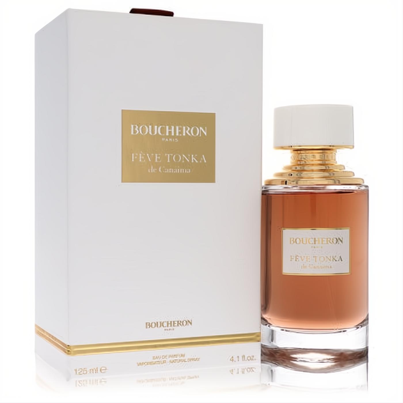 Luxurious Boucheron Feve Tonka De Canaima 4.1 oz unisex EDP. Amber liquid in a sleek glass bottle with gold details and a pristine white box.