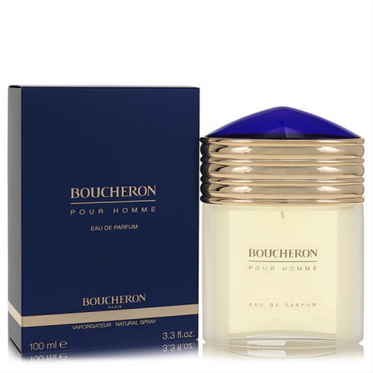 Experience Boucheron Pour Homme 3.3 oz. EDP. Luxurious clear bottle, gold ribbed design, striking blue cap, and elegant navy box.