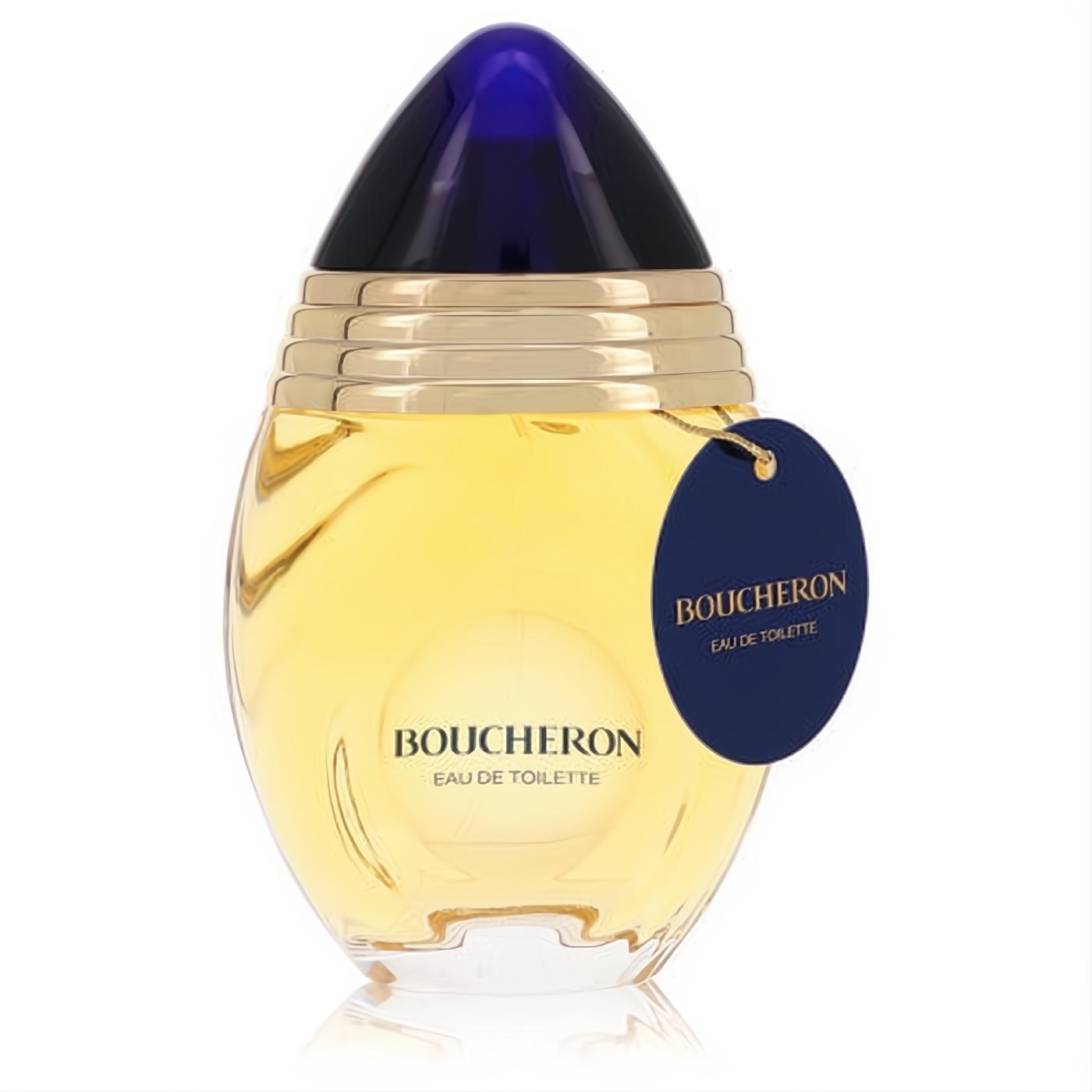 Luxurious Boucheron Eau De Toilette spray. Golden perfume in a clear glass bottle with a striking blue and black cap, and elegant gold-lettered tag.