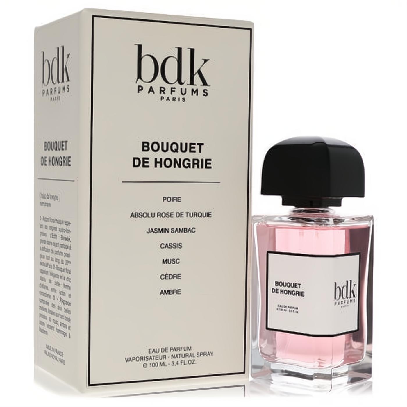 Vibrant BDK Parfums Bouquet De Hongrie 3.4 oz EDP spray. Pink fragrance in a sleek clear bottle with black cap, next to its elegant white box.