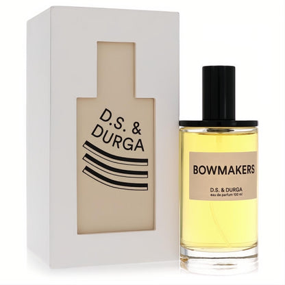 Experience Bowmakers: D.S. & Durga 3.4 oz eau de parfum in a sleek clear glass bottle with radiant yellow liquid, beside its distinctive white box.
