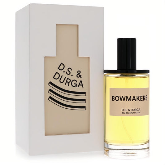 Experience Bowmakers: D.S. & Durga 3.4 oz eau de parfum in a sleek clear glass bottle with radiant yellow liquid, beside its distinctive white box.