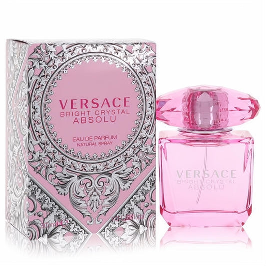 Stunning Versace Bright Crystal Absolu Eau De Parfum. Pink glass bottle with a sparkling faceted cap, next to its ornate pink and silver box.