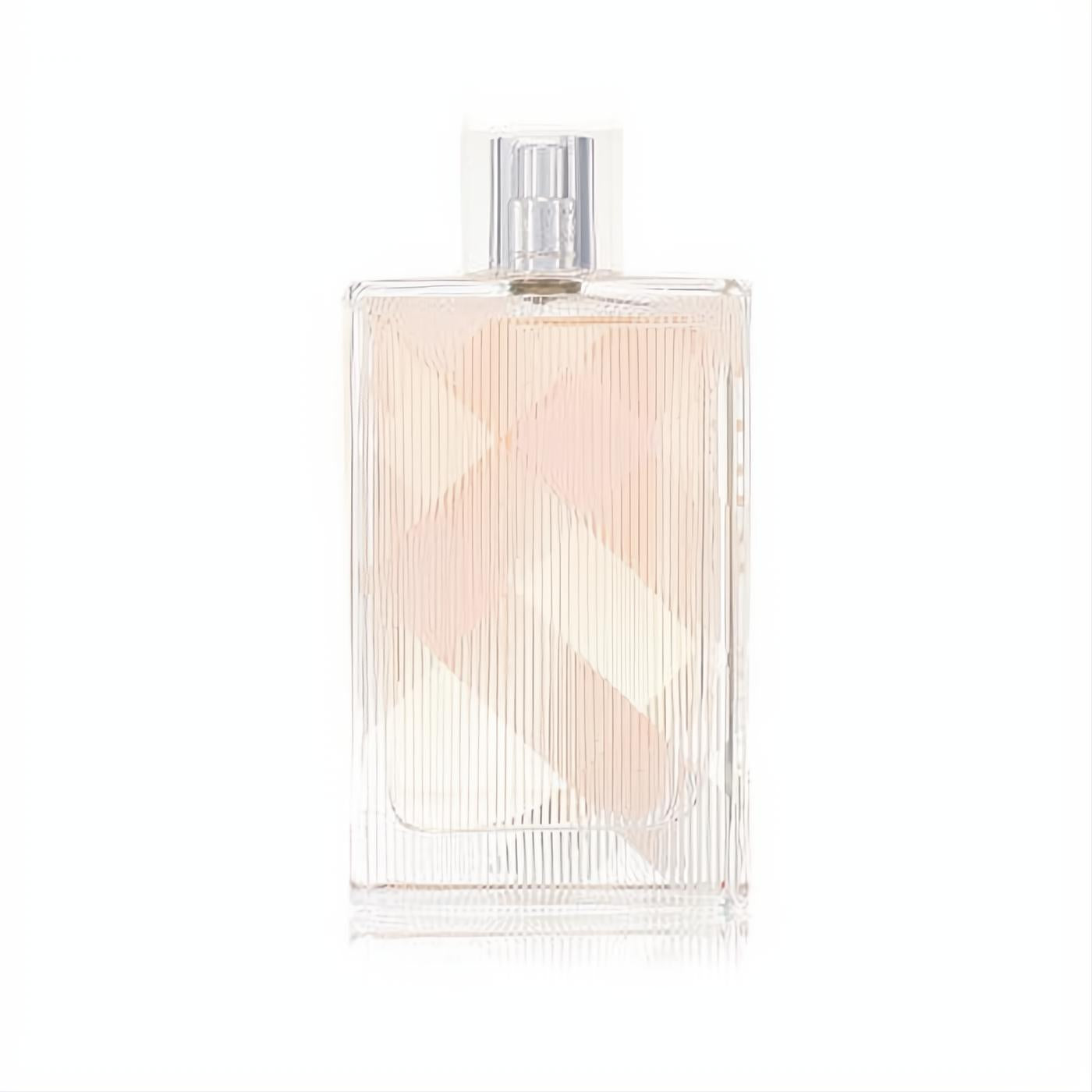 Luxurious Burberry Brit 3.4 oz EDT spray in a clear glass bottle with signature plaid texture and soft pink liquid.