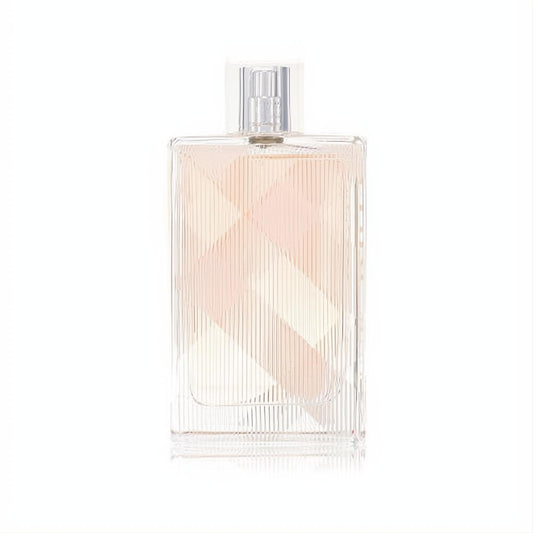Luxurious Burberry Brit 3.4 oz EDT spray in a clear glass bottle with signature plaid texture and soft pink liquid.