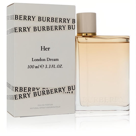 Burberry Her London Dream 3.3 oz EDP. Sleek clear glass bottle, nude cap, and elegant white branded box.