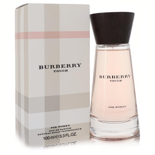 Elegant Burberry Touch 3.3 oz EDP for Women. Clear bottle with soft pink fragrance, dark wood cap, and classic plaid box.