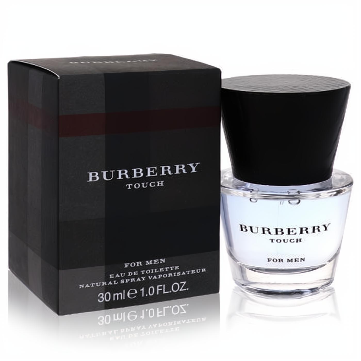 Burberry Touch for Men 1 oz Eau De Toilette. Elegant clear glass bottle with black cap, beside its iconic black plaid box.