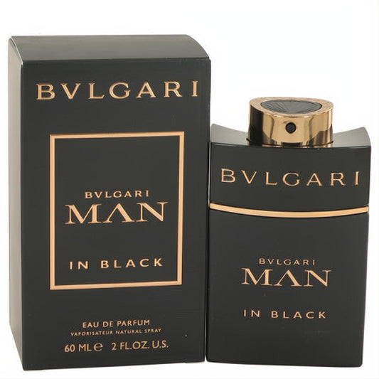 Bold Bvlgari Man In Black 2 oz Eau de Parfum spray. Matte black bottle with striking gold cap and branding.