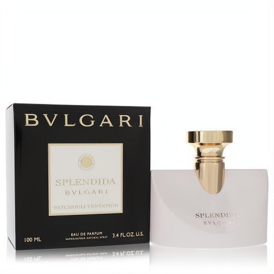 Luxurious Bvlgari Splendida Patchouli Tentation 3.4 oz EDP. Frosted glass bottle with elegant gold cap, beside its sleek black and gold box.