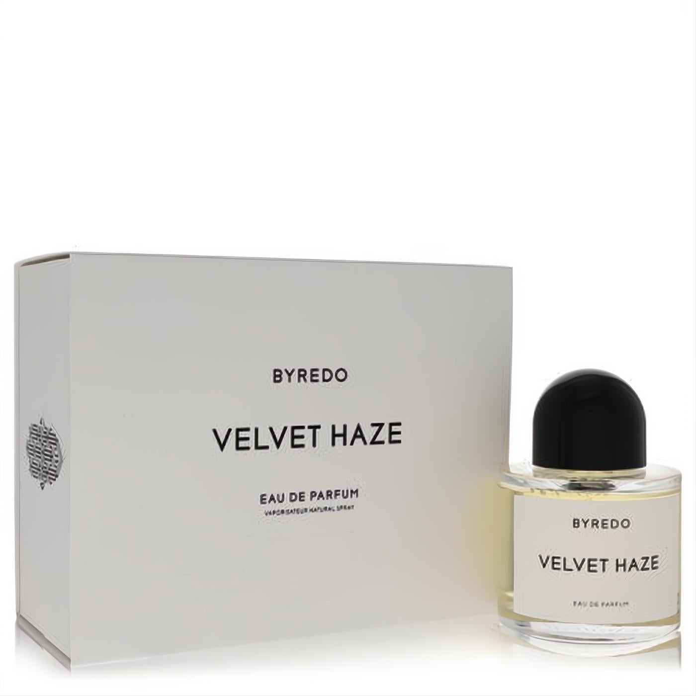 Elegant Byredo Velvet Haze 3.4 oz unisex EDP spray. Clear glass bottle with black cap, beside its crisp white packaging.