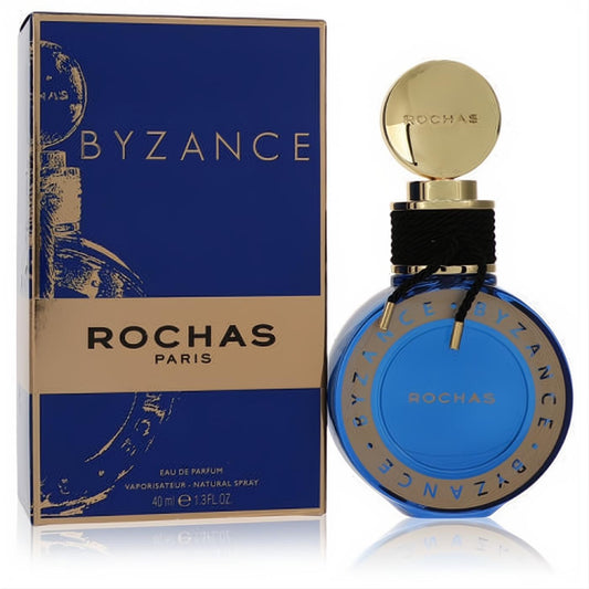 Experience Rochas Byzance 2019 Edition 1.3 oz EDP. Stunning deep blue round glass bottle, gold cap, and elegant black cord.