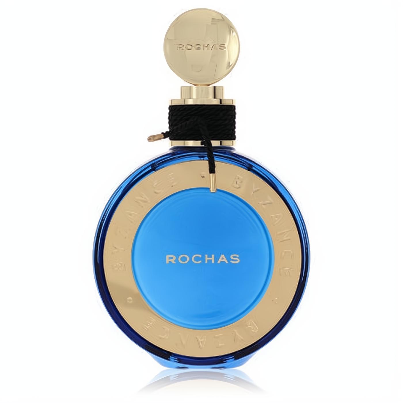 Stunning Rochas Byzance 2019 Edition women's perfume. Vibrant blue round bottle, opulent gold trim, and chic black cord detail.