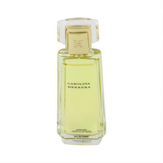 Discover Carolina Herrera Eau De Toilette tester. Sleek glass bottle with golden fragrance, clear geometric cap, and gold CH logo.