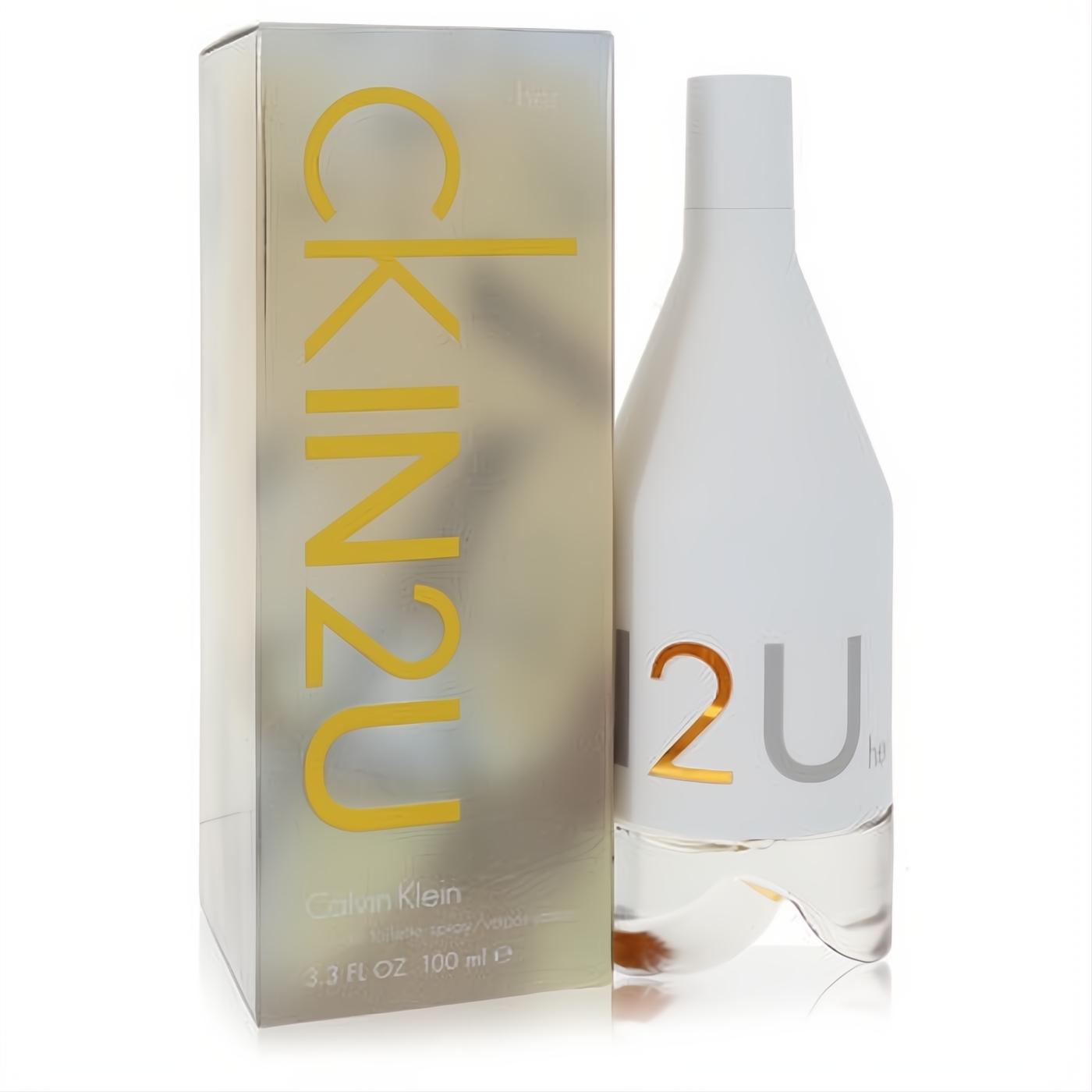 Modern CK In 2U Women's 3.3 oz EDT spray. Features a sleek white bottle with bold gold lettering and a shimmering silver box.