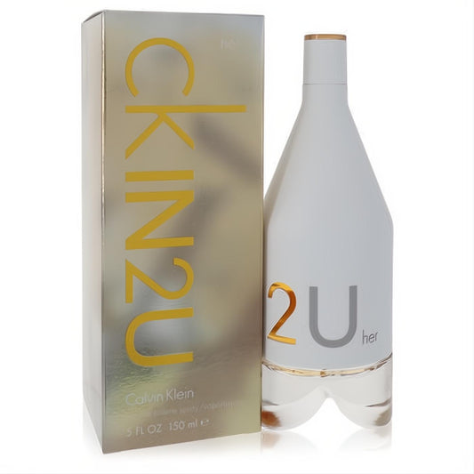 Elegant CK IN2U by Calvin Klein 5 oz EDT spray. Sleek white bottle with clear glass base, gold cap detail, and shimmering metallic box.