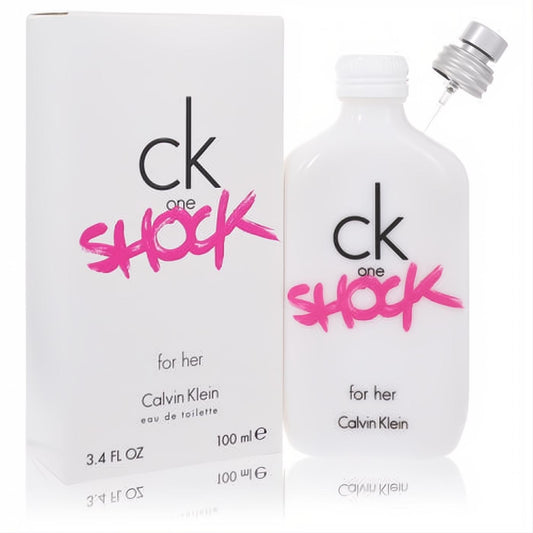 Experience CK One Shock for Her 3.4 oz EDT. Sleek white bottle and box with a vibrant pink "SHOCK" logo.