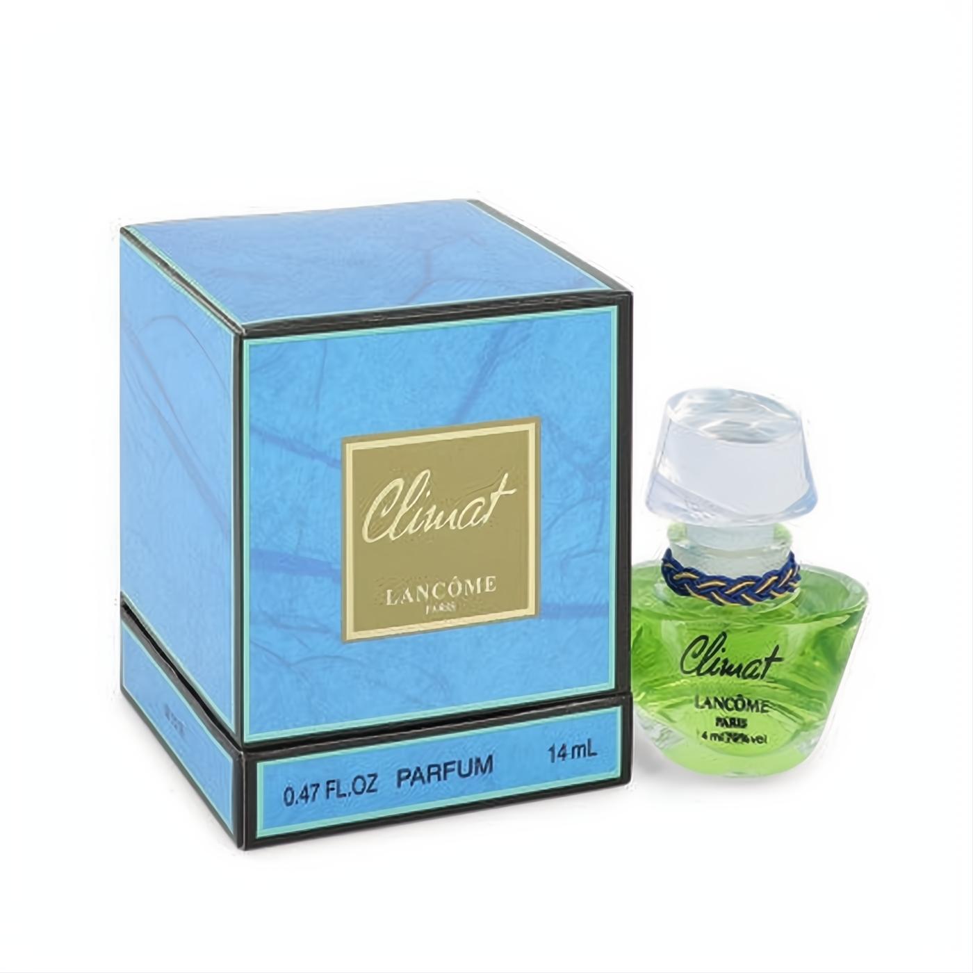 Experience Lancome Climat .47 oz pure perfume. Elegant green glass bottle with braided neck detail, paired with its classic blue box.