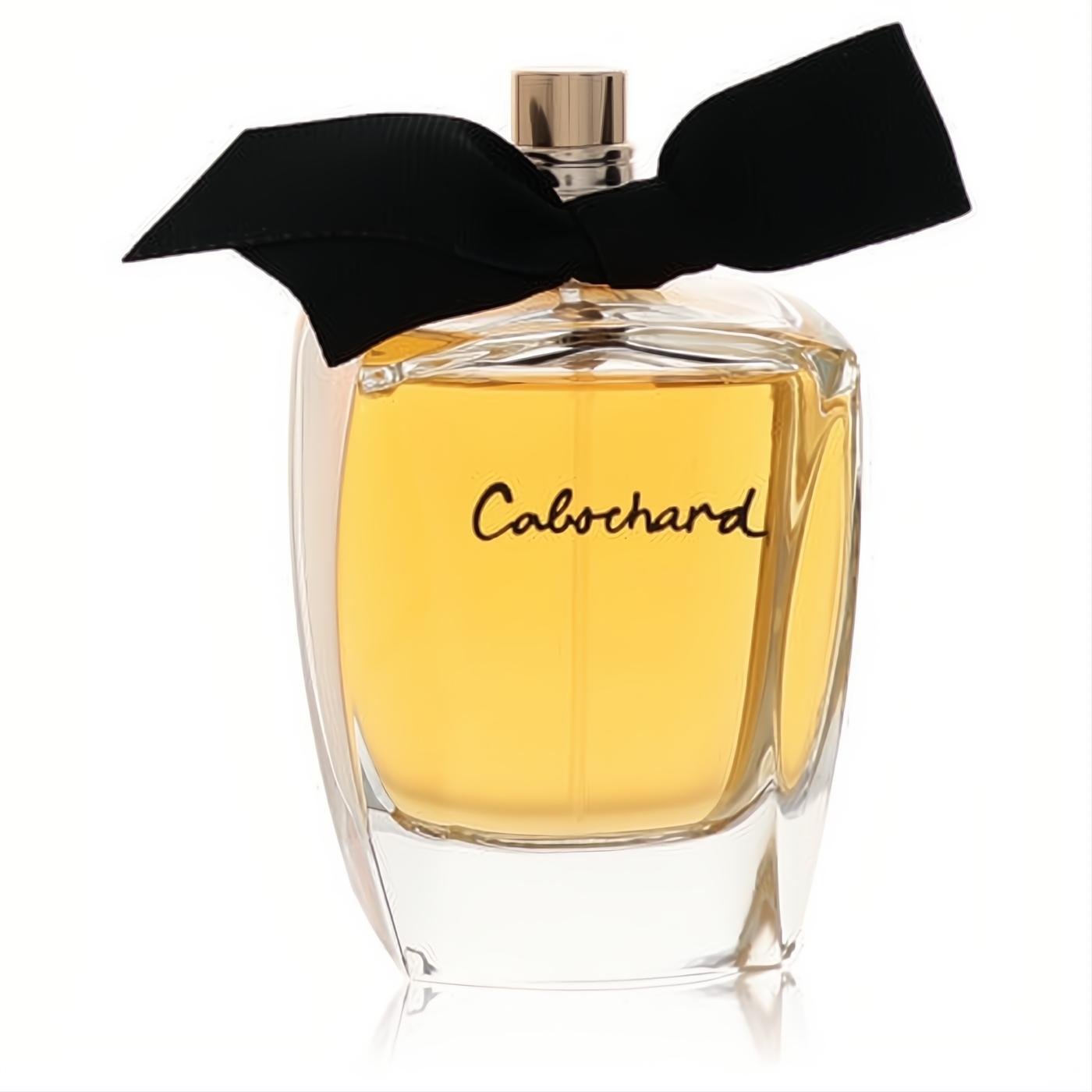 Cabochard by Parfums Gres Eau de Parfum spray. Clear glass bottle with golden liquid, gold cap, and elegant black bow.