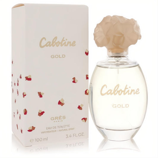 Cabotine Gold 3.4 oz EDT spray. Clear glass bottle with a sculpted peach floral cap and elegant cream box with gold details.