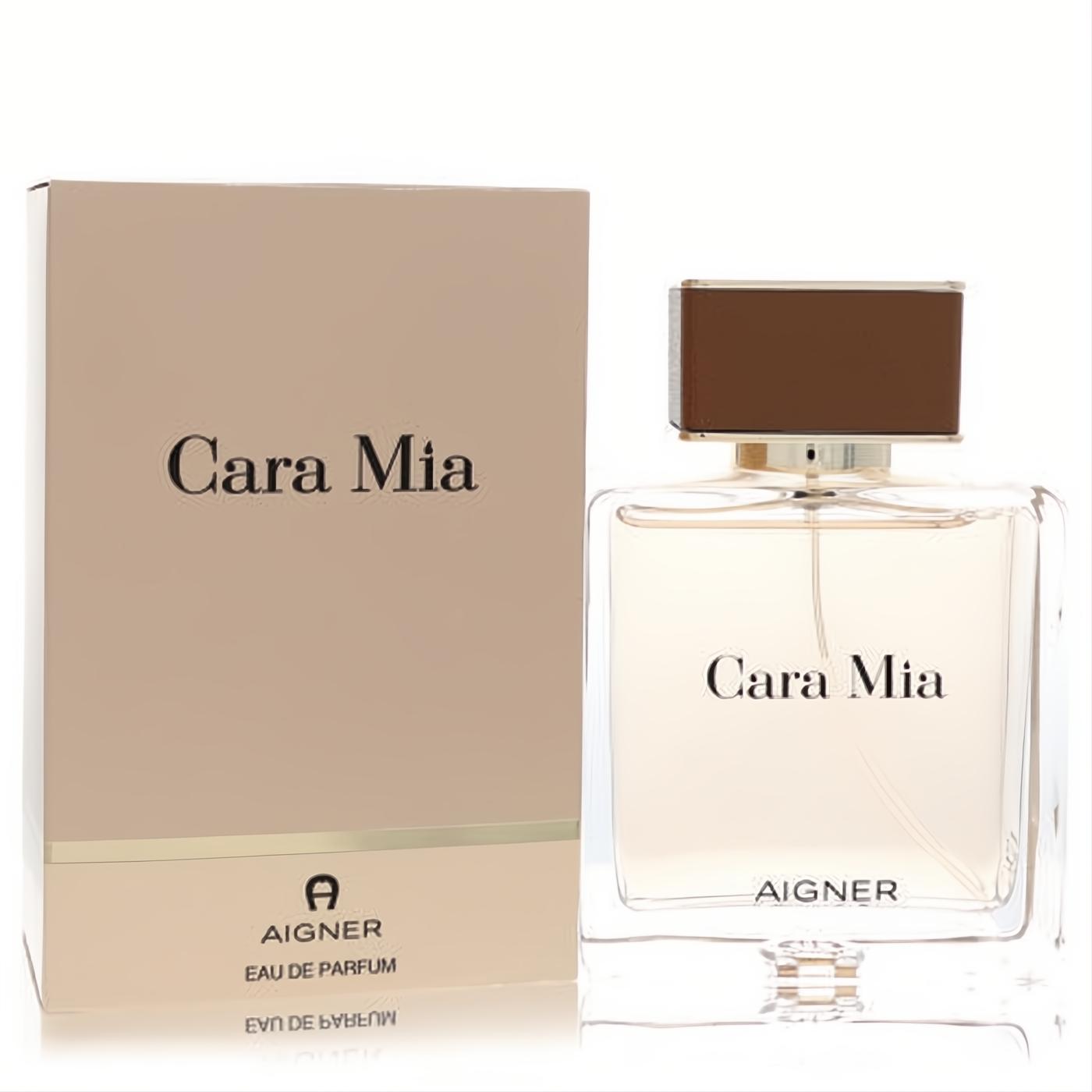 Cara Mia 3.4 oz Eau de Parfum. Elegant clear glass bottle with brown cap and matching beige box. A sophisticated women's fragrance.