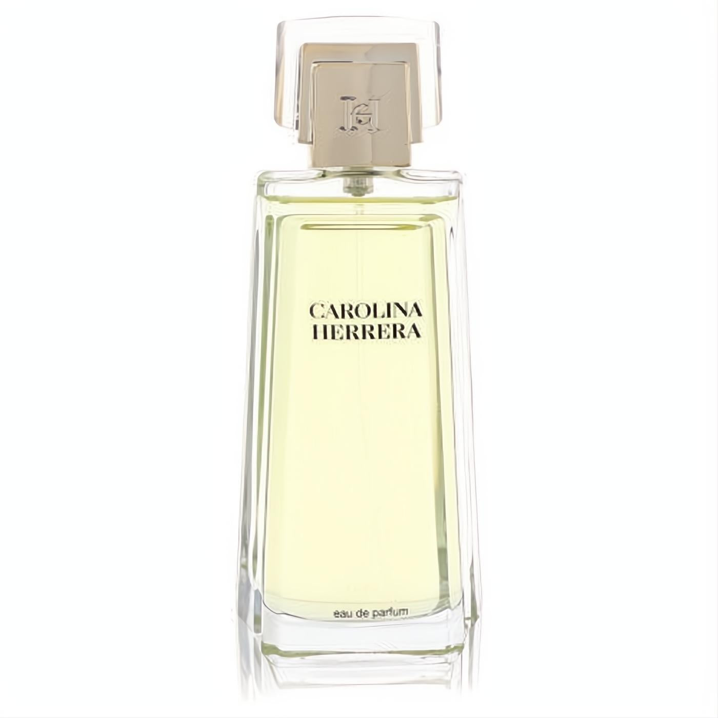 Experience Carolina Herrera Eau De Parfum tester. Elegant clear glass bottle, light yellow fragrance, and signature gold cap.