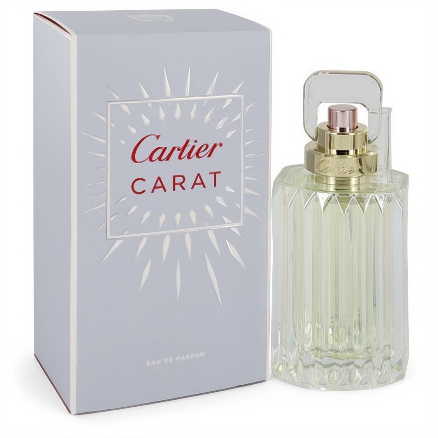 Cartier Carat 3.3 oz women's Eau De Parfum. Dazzling faceted glass bottle with gold and rose gold accents, clear cap, and elegant light blue box.