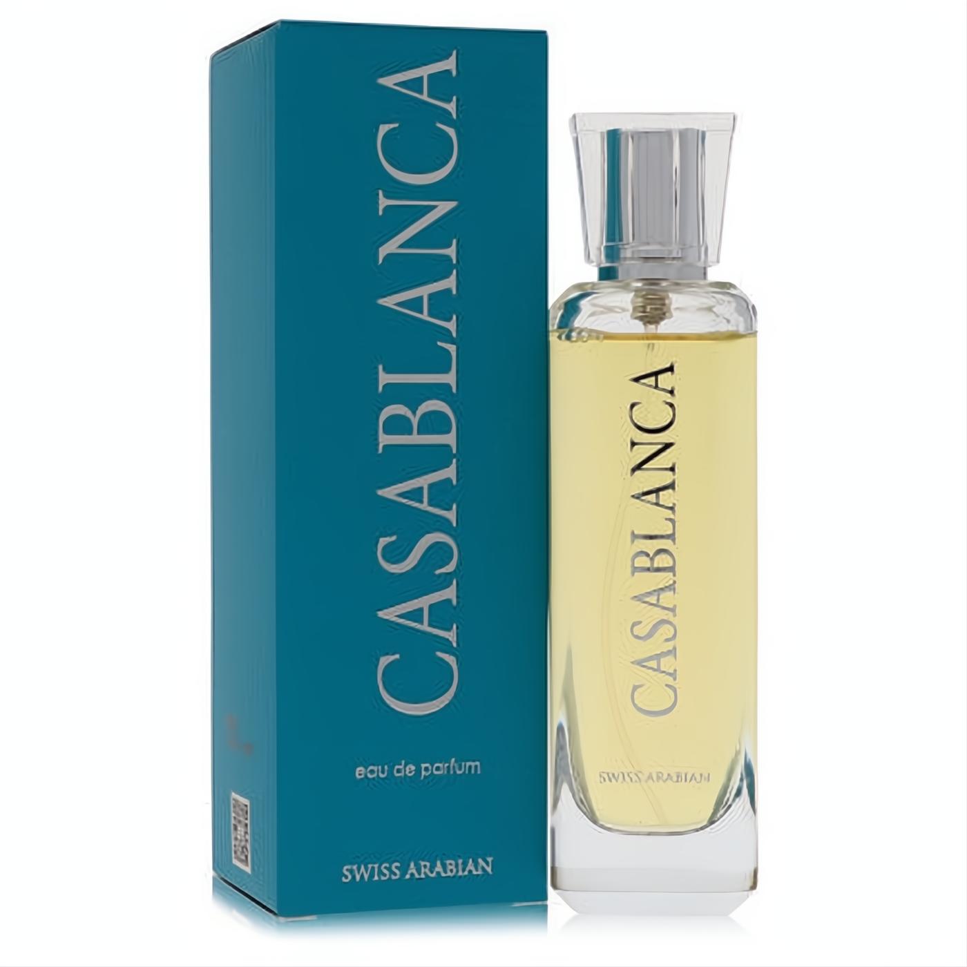 Swiss Arabian Casablanca unisex eau de parfum: elegant clear glass bottle with golden liquid, paired with its vibrant teal box.