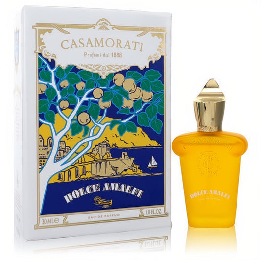 Exquisite Casamorati Dolce Amalfi 1 oz EDP. Frosted yellow bottle with gold cap, next to its artfully illustrated white box.