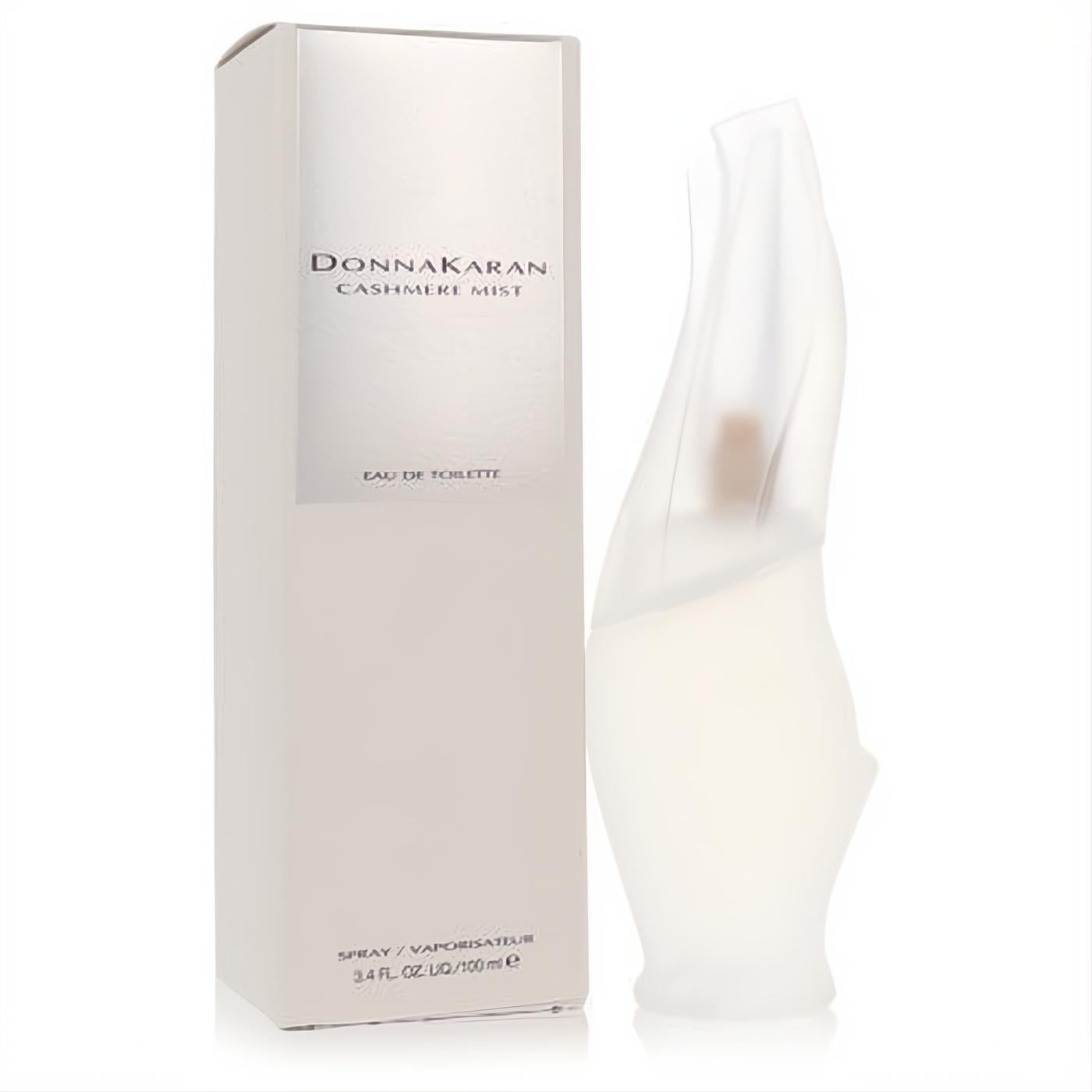 Elegant Donna Karan Cashmere Mist 3.4 oz Eau De Toilette spray, featuring a frosted sculptural bottle and sleek silver box.