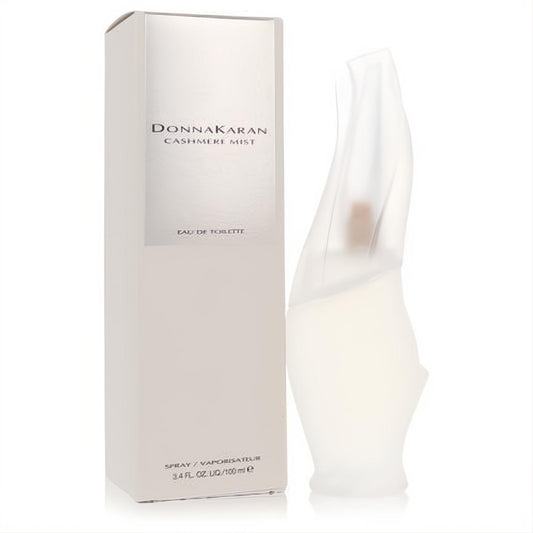 Elegant Donna Karan Cashmere Mist 3.4 oz Eau De Toilette spray, featuring a frosted sculptural bottle and sleek silver box.