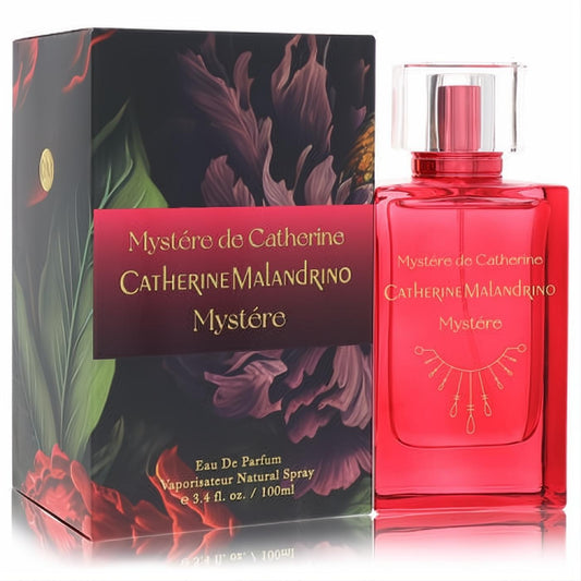 Catherine Malandrino Mystere 3.4 oz EDP in a vibrant red bottle with elegant gold accents and a unique symbol, beside its floral box.