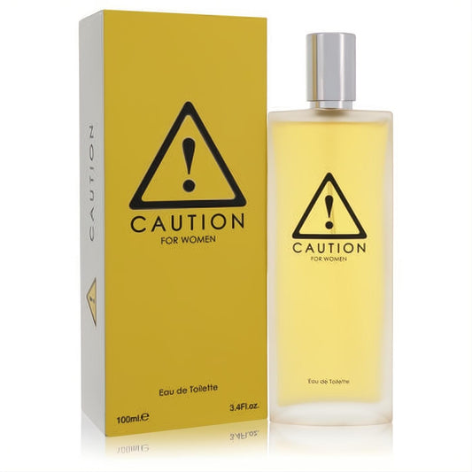Bold Caution by KraftEau 3.4 oz women's EDT. Vibrant yellow box and frosted glass bottle with a striking black warning triangle design.