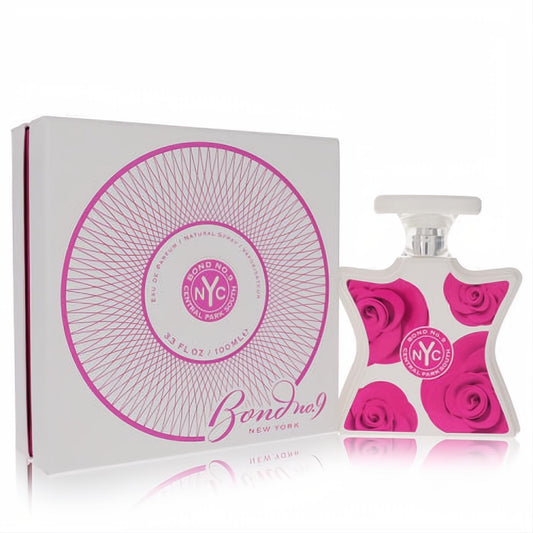 Bond No. 9 Central Park South 3.4 oz EDP. Iconic white bottle with bold pink roses and NYC logo, beside its matching box.