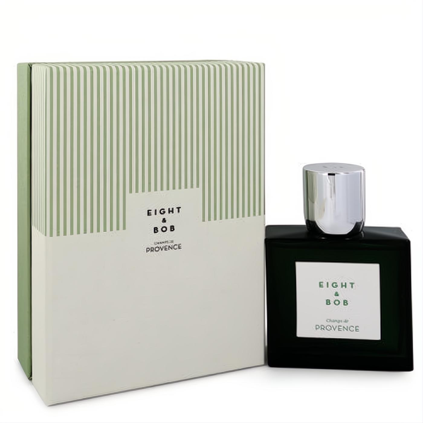 Experience Champs De Provence. Eight & Bob's elegant unisex EDP in a dark green bottle with a sleek silver cap and striped box.