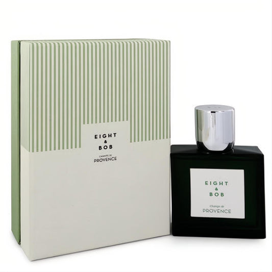 Experience Champs De Provence. Eight & Bob's elegant unisex EDP in a dark green bottle with a sleek silver cap and striped box.