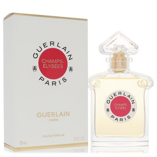 Guerlain Champs Elysees 2.5 oz Eau De Parfum. Elegant clear glass bottle with gold sprayer and unique cap, next to its white and gold box.