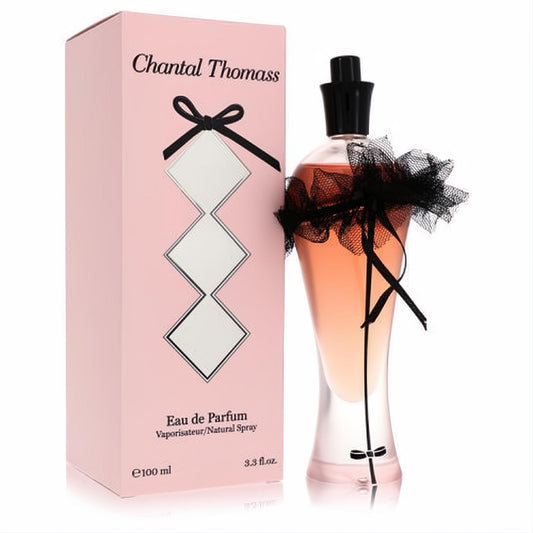 Chantal Thomass Pink 3.3 oz Eau de Parfum. Elegant pink bottle with black cap, delicate black ribbon, and tulle bow. Chic pink box.