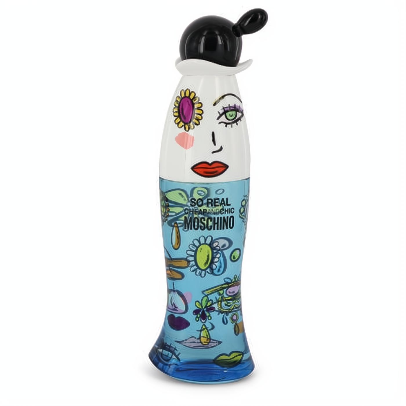 Iconic Moschino So Real perfume bottle: white top with drawn face, black bun cap, and blue base with vibrant artistic doodles.