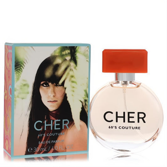 Captivating Cher Decades 60's Couture 1 oz Eau de Parfum. Round glass bottle, bold orange cap, and retro box with iconic Cher.