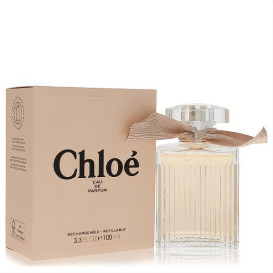 Luxurious Chloe Eau De Parfum 3.3 oz refillable spray. Elegant ribbed glass bottle with a chic beige ribbon and peach box.